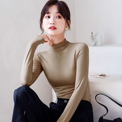 Naiste puhta mustriga pikkade varrukatega polosärk