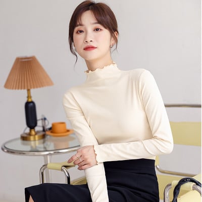 Naiste puhta mustriga pikkade varrukatega polosärk