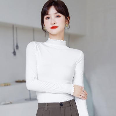 Naiste puhta mustriga pikkade varrukatega polosärk