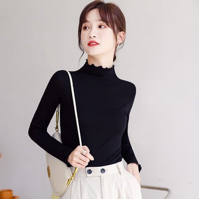 Naiste puhta mustriga pikkade varrukatega polosärk