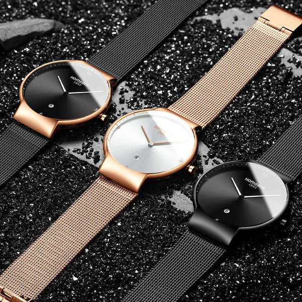 Vyriškas mechaninis laikrodis su metaliniu dirželiu