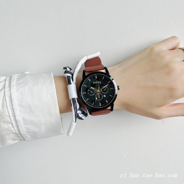 Ümmarguse sihverplaadi ja nahkrihmadega meeste käekell