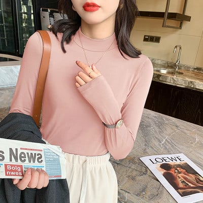 Puhta mudeliga puuvillane kõrge kaelusega pluus paljudes värvides