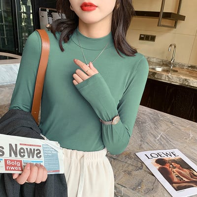 Puhta mudeliga puuvillane kõrge kaelusega pluus paljudes värvides