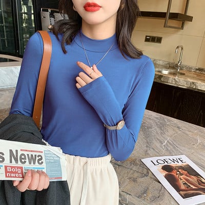 Puhta mudeliga puuvillane kõrge kaelusega pluus paljudes värvides