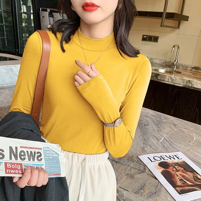 Puhta mudeliga puuvillane kõrge kaelusega pluus paljudes värvides