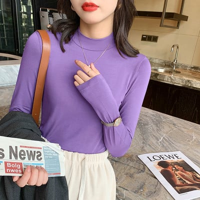 Puhta mudeliga puuvillane kõrge kaelusega pluus paljudes värvides