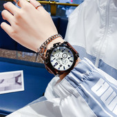 Vyriškas laikrodis su apvaliu ciferblatu ir odiniu dirželiu