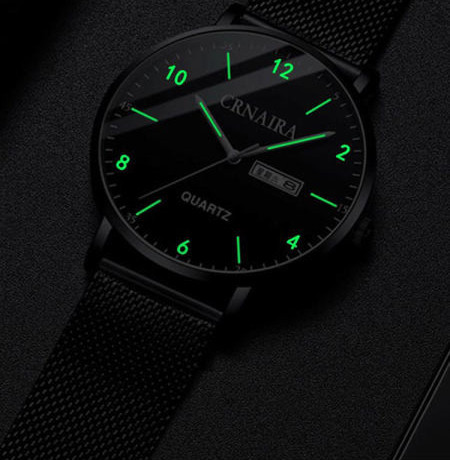 Muški sat s metalnim remenom i svjetlećim kazaljkama