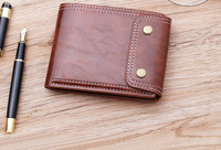 Férfi pénztárca gombbal és cipzárral