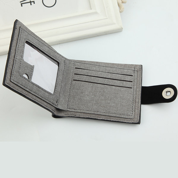 Maža tekstilinė piniginė su metaliniu užsegimu