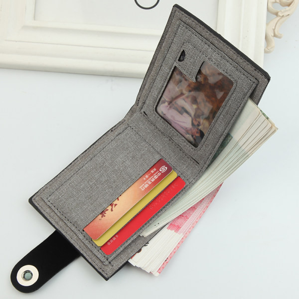 Maža tekstilinė piniginė su metaliniu užsegimu