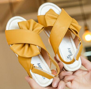 Tüdrukute sandaalid 2021, suvi, uued tüdrukute vibuprintsessikingad Lamedad sandaalid Laste pehmed ühevärvilised libisemiskindlad jalatsid