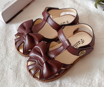 Tüdrukute sandaalid 2021, suvi, uued tüdrukute vibuprintsessikingad Lamedad sandaalid Laste pehmed ühevärvilised libisemiskindlad jalatsid