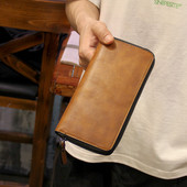 Rudos spalvos vyriška odinė piniginė su užtrauktuku