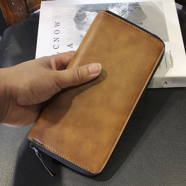 Rudos spalvos vyriška odinė piniginė su užtrauktuku