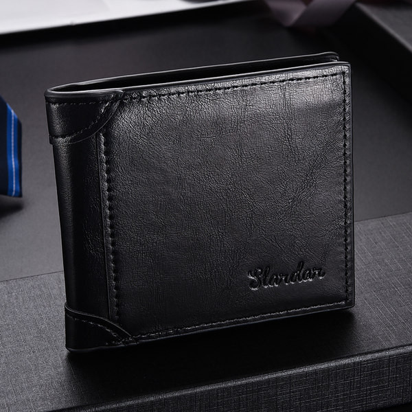 Moodne meeste nahast rahakott kirjaga