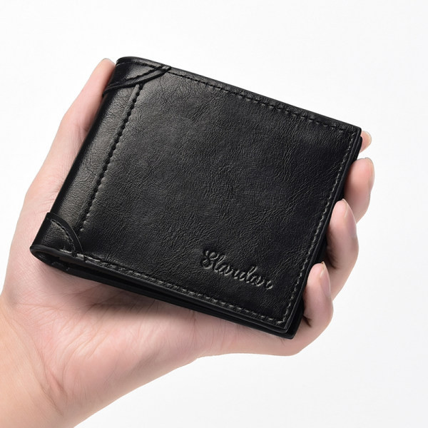 Moodne meeste nahast rahakott kirjaga