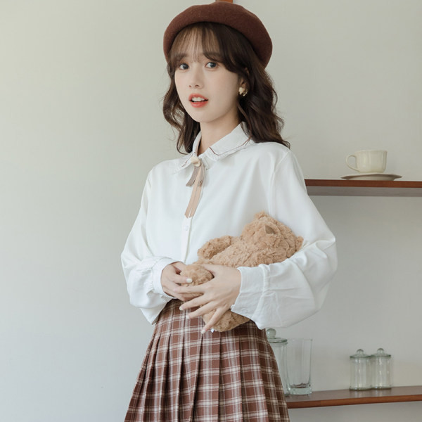 Moderna ženska košulja s klasičnim ovratnikom i kravatama