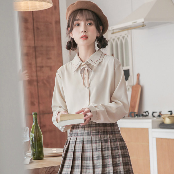 Moderna ženska košulja s klasičnim ovratnikom i kravatama