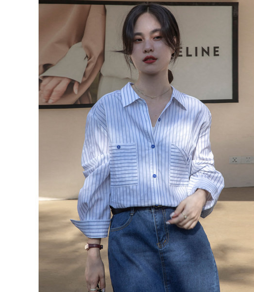 Laia mustriga triibuline särk nööpide ja taskuga