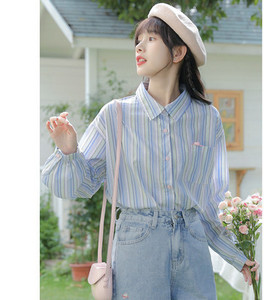 Ženska prugasta bluza s džepom