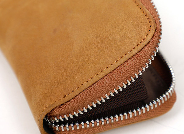 Tvarkinga vyriška piniginė su užtrauktuku