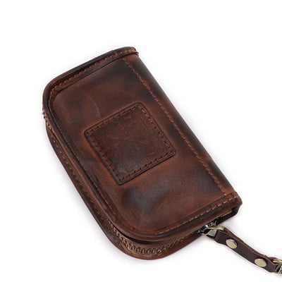 Odinė vyriška piniginė tinkanti raktams ir kreditinėms kortelėms laikyti