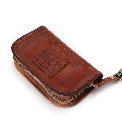 Odinė vyriška piniginė tinkanti raktams ir kreditinėms kortelėms laikyti