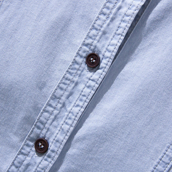 Moteriški džinsiniai marškiniai su sagomis