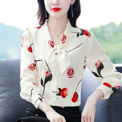 Női ing virágos motívumokkal és szalaggal