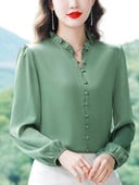 Elegantna ženska košulja dugih rukava i špicastog dekoltea