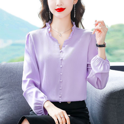 Elegantna ženska košulja dugih rukava i špicastog dekoltea