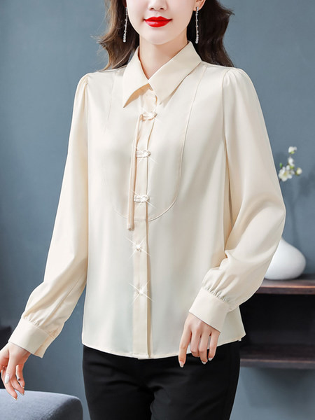 Elegantna košulja s dugim rukavima i kopčanjem na gumbe