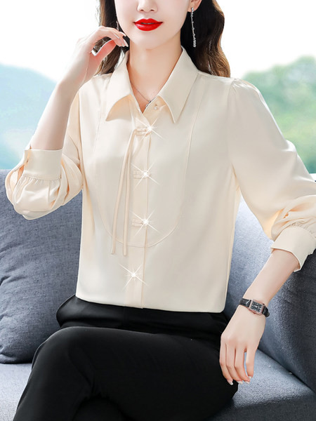 Elegantna košulja s dugim rukavima i kopčanjem na gumbe