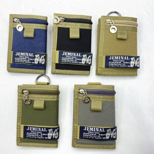 Tekstilni muški novčanik s kopčanjem na čičak i zip pretincem za kovanice