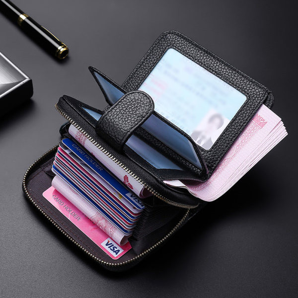 Kožni muški novčanik s patentnim zatvaračem i gumbom