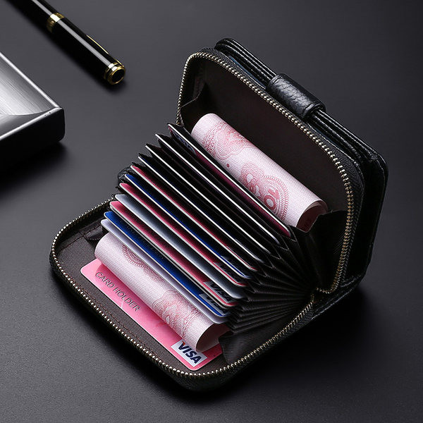 Kožni muški novčanik s patentnim zatvaračem i gumbom