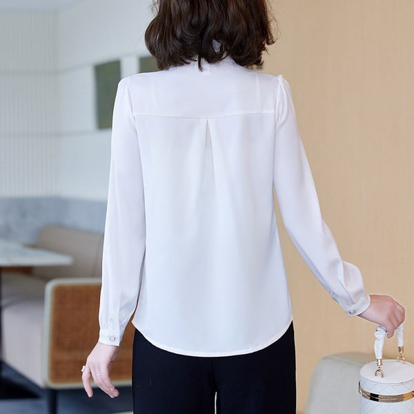 Elegantne pikkade varrukate ja tikandiga särk