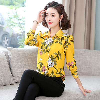 Moteriški marškiniai su klasikine apykakle ir gėlių motyvais