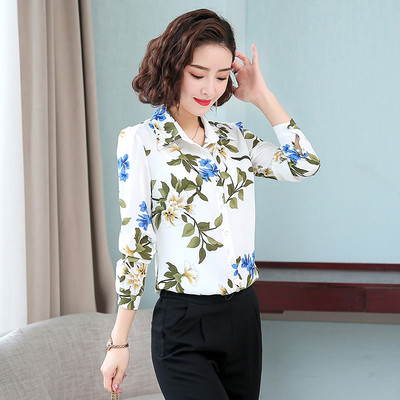 Moteriški marškiniai su klasikine apykakle ir gėlių motyvais