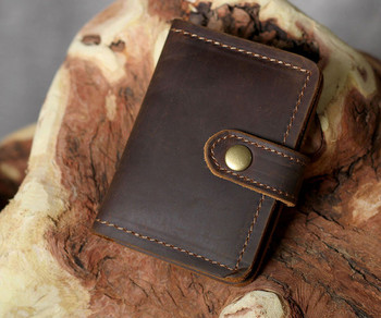 Мъжки портфейл от изкуствена кожа в кафяв цвят