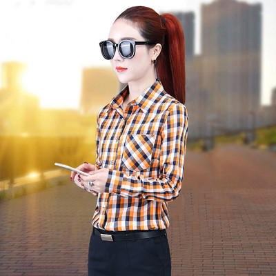 Ženska prugasta košulja s džepom i gumbima