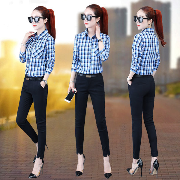 Ženska prugasta košulja s džepom i gumbima