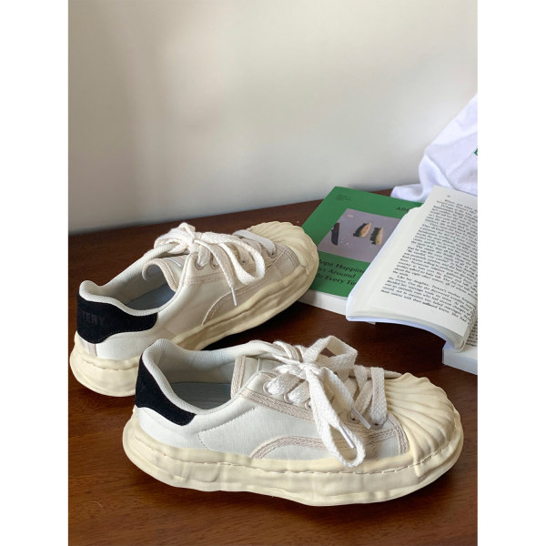 Uus mudel naiste ümarad paeltega tossud