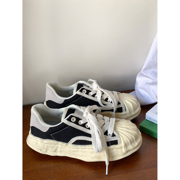 Uus mudel naiste ümarad paeltega tossud