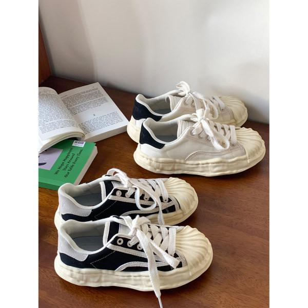 Uus mudel naiste ümarad paeltega tossud