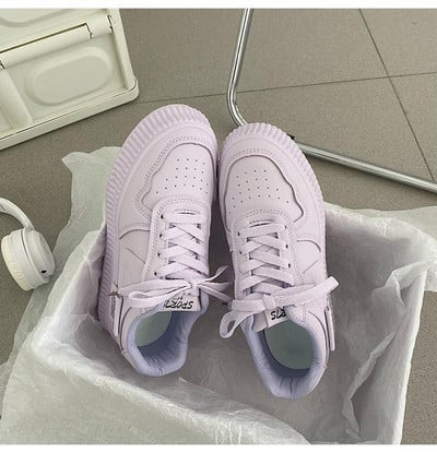 Naiste logoga pitsilised vabaaja tossud