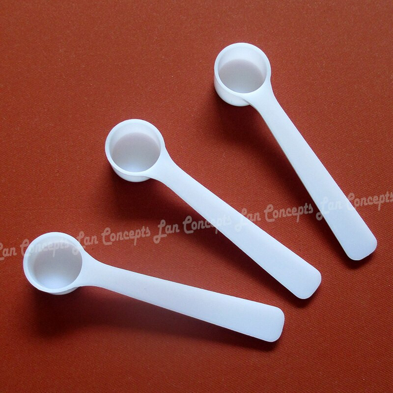 100 vnt./stal. 0.5g Plastikinis kaušelis 0.5 gramo PP matavimo šaukštas 1ml matavimo įrankis - 70X16X10.5mm baltas Nemokamas pristatymas