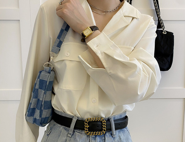 Ženski kožni remen sa metalnom kopčom